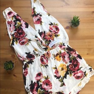 Kendall & Kylie white pink and floral colored romper with v neck